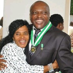 Mrs. Abigail Inyang embraces her eldest Child Prof. Hilary Inyang at the Presidential villa of the Federal Republic of Nigeria on December 5, 2013 when Prof. Hilary won the Nigerian National Order of Merit (NNOM) in Engineering and Technology  - Nigerias