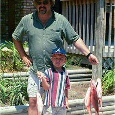 Adam and his dad.  Deep sea fishing out of Fort Walton.