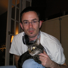 Adam - Music and kitty, his loves.