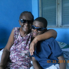 Grandma and Kwame relaxing at home.