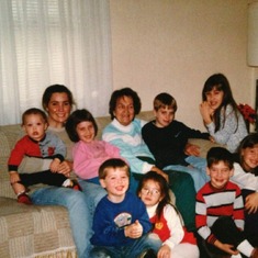 Mimi with her grandchildren [Jen, Jacob, Emily, Ethan, Jill, Alexander, Nick, Whitney, Alexandra -- missing Jarrett and Scott]