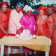 Dad with his way Fe and relatives at his wife's birthday party