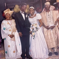 Mommie and Daddie with Bayo and Toun at their wedding 