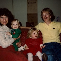 Ahja (age three and a half) with mom Pat, dad Ron, and brother Adam