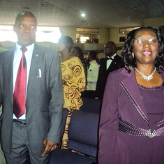 Standing with her deputy Vice-Chancellor (Prof. Ogbulogo) 