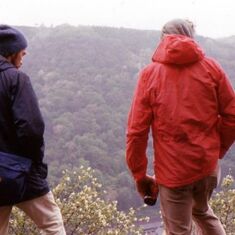 Al and Larry pondering a riverside during a day hike in Europe.  He is still hiking with me.