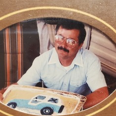 daddy with his jeep cake for his birthday. Mom made the cake for him
