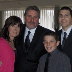 Sue and her husband Todd, son's Sam and Michael. March 2010