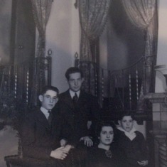 Our Dad, Mother Lillie Frank and brothers Bob and Jules. In the Arlington Avenue home in SLC, Ut.