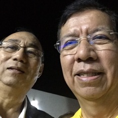 With childhood friend and neighbor Jun Ymson.