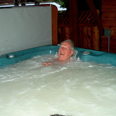 2004: Soaking sore muscles after yard work.  During visit to Mary and Rand in Alaska.