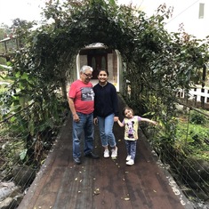 Dad with his granddaughter and Paulita in Ecuador.