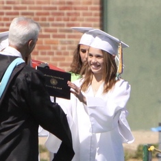 Alex, as she graduated from Damascus HS Class of 2011, diploma bestowed by Mr. Domergue.  