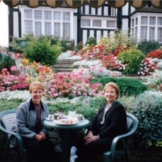 Mary having tea with Jeanne East in England