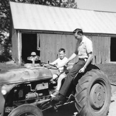 Al with son, David, visit the farm in Wisconsin