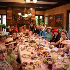 Alice (at end of  table) and her friends at a Downton Abbey High Tea!