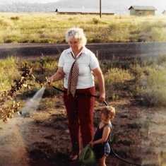 Grandma and Justin gardening