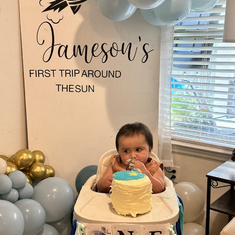 Baby Jameson enjoying his BDay Cake