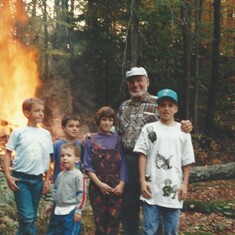 Grampie's idea of a campfire with Adam, Andrew and Brian, Jason and Erin.