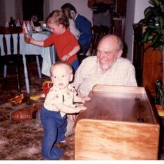 Grampie giving Patti's son, Paul, the toy box he had made for him, just as he had for every grandchild