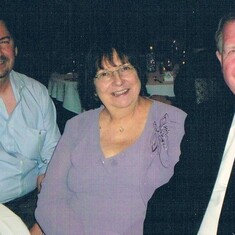 Beth's resized picture.... and what may very well be the worst picture of me ever! at least my eyes weren't closed... much. Mom looks bright eyed and bushy tailed though. me, Mom, Dad at Angela's reception in Vegas