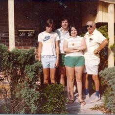 Chris, Andy, Alma & Lester Baldwin in front of our house in Clearwater.