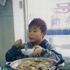 Dong jin eating his favorite fish soup