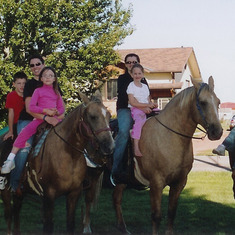 Enjoying Alma's horses with family