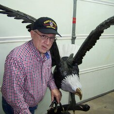 Alton K. Crook with a bronze eagle - Friday, April 13, 2018