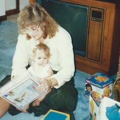 Mandy and Mom opening presents at 1st birthday party, September 1989