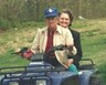 Mom and Dad riding the 4-wheeler in 1997.  Jamie's 4-wheeler was later stolen as well as mine.