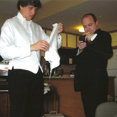 getting dressed in tux with robbie
