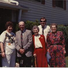Dad: "Alma, Mother & Me with Dallas & Eleanor Hawkes in front of our house in Clearwater"