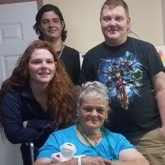 Andrew with his siblings, and Nana