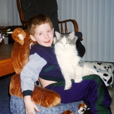 Andrew and his cat Precious. He had this cat for 15 years and he took his kitty with him to heaven.