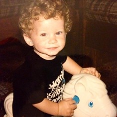 Andrew - When he was a baby on a toy horse