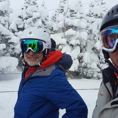Rick and Drew waiting to ride Imperial Chair on a pow day.