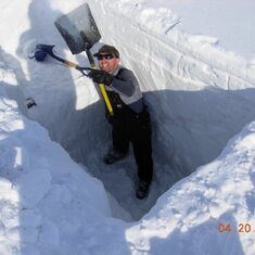 Digging snow pit on North Slope, Alaska
