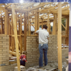 Bricklaying with Kellie at work when she was a toddler 