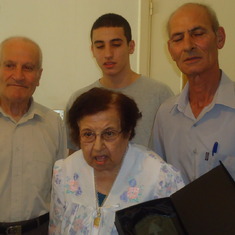 Receiving award in 2011 from her Student Kamel Tanous