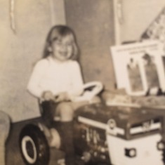 Christmas 1969, Smiling, she loved the tractor