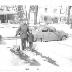 044 Dad and Stew plow their way through a snowy Kansas Winter