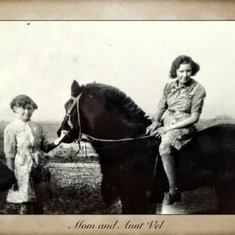 Mom holding Vel on Horse