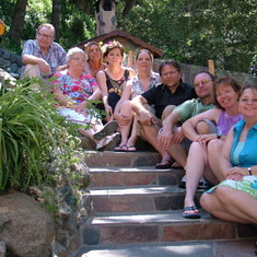 Dad and Mom with all 7 of us on stairs at Ben;s