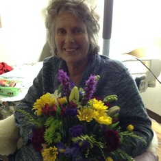 Anne receiving flowers at one of her many hospital stays. 