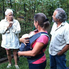 AK showing my mom and stepdad around the garden back when AK grew corn. (Sept. 2011)