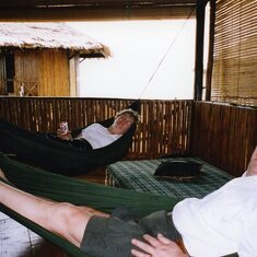 putting their feet up at an eco-resort on Pulau Batam, Indonesia