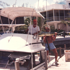 Art on his boat - Mike holding catch