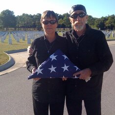 Art and Kay holding U.S. flag following dad's funeral with full military honors @ Barancas National Cemetery, Pensacola Naval Air Statio, Pensacola, Florida December 6, 2010