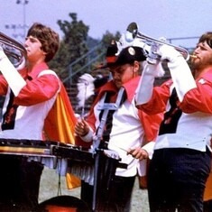 Son, Brent (left), on tour with Geneseo Knights Drum & Bugle Corps.